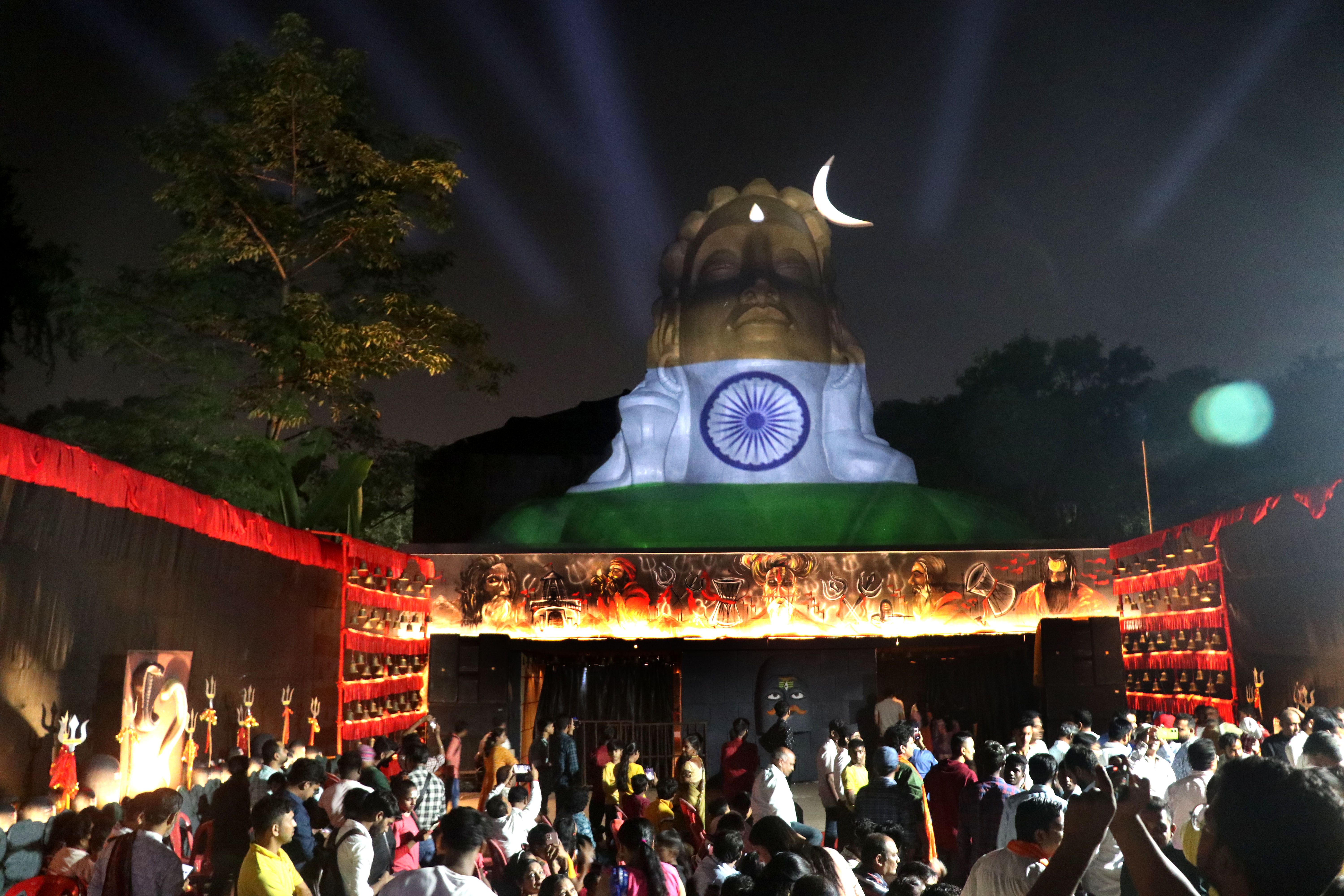 Adiyogi themed Ranchi Railway Durga Puja pandal illuminated during the 2024 laser show